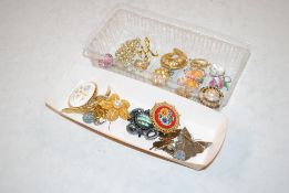 Two boxes containing vintage and other costume brooches