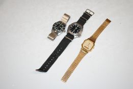 A Tara All Sport stainless steel wristwatch; a Lourus wristwatch and a Sea Pro wristwatch