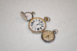 A large silver plated pocket watch; a Smiths pocket watch and one other