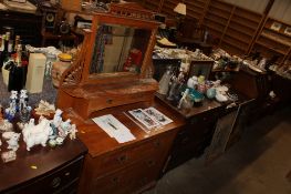 A mirrored back three drawer dressing chest