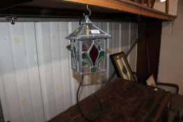 A stained and leaded glass pendant light fitting