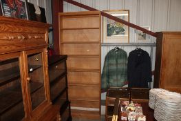 A pine open fronted bookcase fitted six shelves