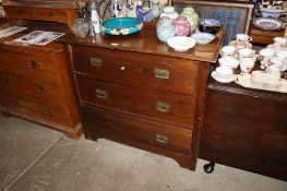 An Art Nouveau style chest fitted three drawers