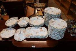 A collection of James Notcutt & Sons for Limoges floral and gilt decorated dinnerware