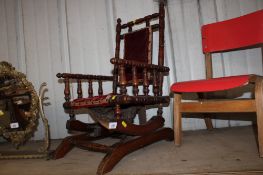 An antique child's rocking chair AF