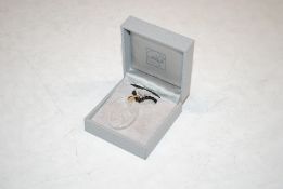 A Lalique glass pendant necklace