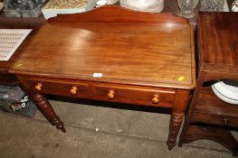 A 19th Century mahogany side table fitted two drawers raised on turned tapering supports