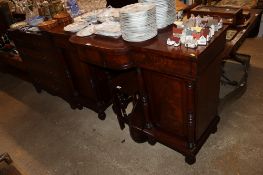 A Victorian mahogany twin pedestal sideboard fitted three drawers to frieze with cellarette drawer