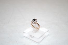 A 9ct gold sapphire and diamond cluster ring, ring size M, 3gms total weight