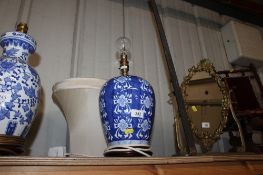 An Oriental blue and white jar and cover converted to table lamp