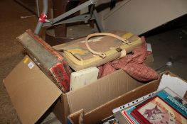 A box containing French fabric, a Kelim rug bag and three tins