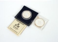 A 2009 silver proof Millionaires Collection Charles I crown and a 1996 Gibraltar 70th Birthday
