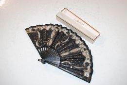 A Pique ware style fan contained in J. Duvelleroy box