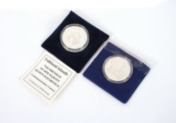 A Falkland Islands 70th Birthday silver proof commemorative crown and an Isle of Man silver proof