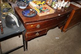 A 19th Century bow front sideboard fitted 2 short under one long drawer AF