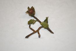 In the style of Richard Cooper, a bronze branch 12cm x 10cm in extremes
