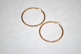 A pair of 9ct gold hoop earrings, 3.2gms total weight