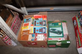 Two boxes containing various Ordnance Survey maps and car manuals