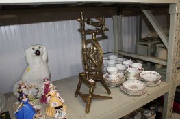 A brass miniature spinning wheel