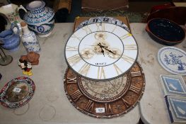 Three modern wall clocks