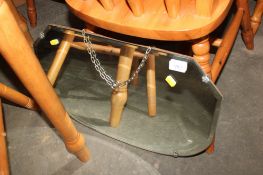 A bevel edged wall mirror