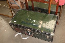A metal bound travelling trunk initialled A.C.C.