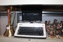An Olympia typewriter in fitted case