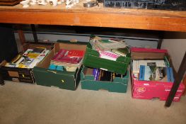 Five boxes containing various Ordnance Survey maps, car manuals, revision books etc.