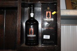 A bottle of Sandeman Tawny Porto, and original box