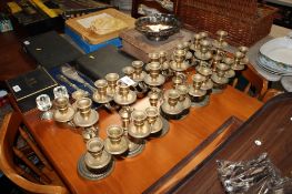 Six brass candelabras