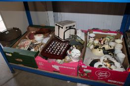 Three boxes containing various decorative items to include thimbles, face masks, etc.