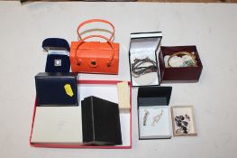 A collection of various costume jewellery to include bangles, necklaces, earrings