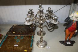 A pair of silver plated candelabras