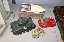 Two tin plate toys; a jet propelled speed boat; and a Mimic Toys tank AF