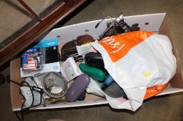 A box containing various sunglasses; a model of a motorbike; a mantel clock and a desk fan