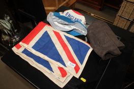 A Union Jack; an England hat and a pair of gloves