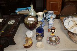 A collection of various decorative items to include pottery vases; Prattware lid; silver plated jug;