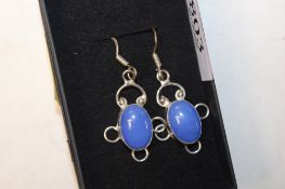 A pair of 925 silver and blue stone set earrings