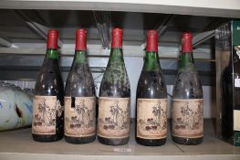 Five bottles of Vin Du Patron wine