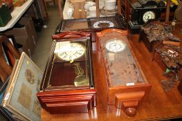 Three reproduction cased wall clocks