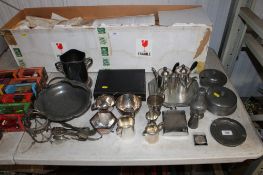 A collection of various metalware to include pewter pot and covers, silver plated wine cooler, cased