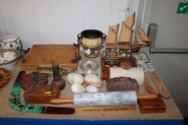 A collection of hardstone eggs, an Art Glass vase, stoneware hot water bottle, wooden model boat,