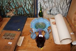 Three Caithness coloured vases; a coloured glass jug, bowl and a purple Art Glass vase having