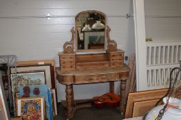 A Victorian style dressing table fitted eight drawers
