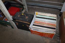 A box and a case containing various records