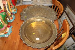 Two large brass trays