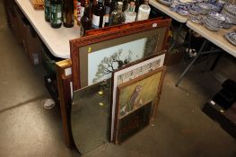 A collection of various pictures, prints and mirrors