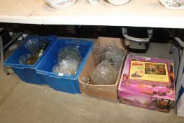 Three boxes containing various glassware and a punch set