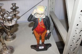 A cast iron door stop in the form of mr Pickwick