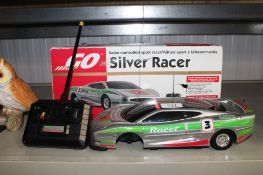 A Silver Racer remote control car - sold as seen